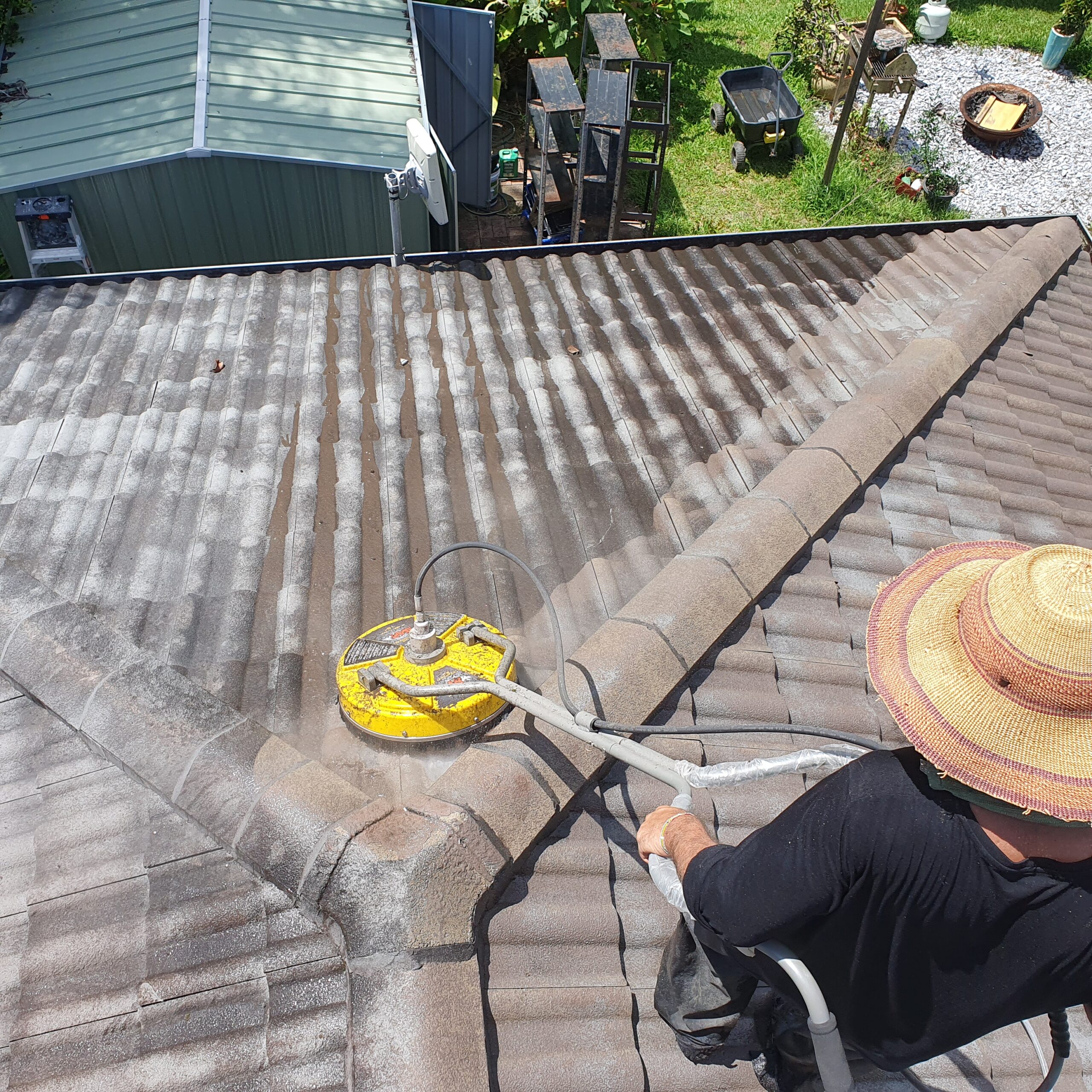 A home in Byron Bay undergoing roof cleaning and maintenance.